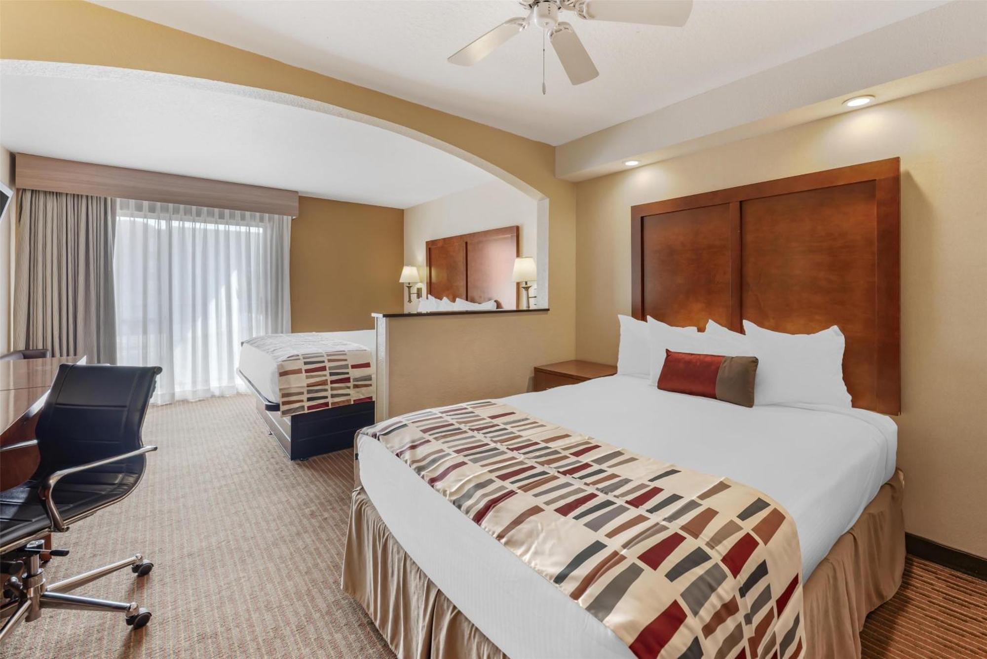 King Room with One King Bed and One Queen Bed - Non-Smoking